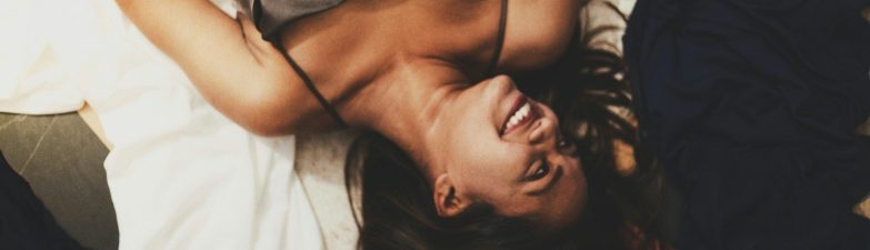 a person lying on a bed